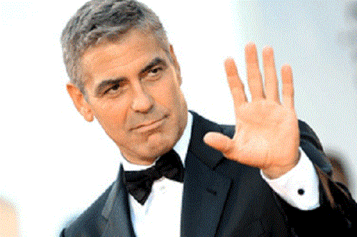 Corc Kluni “Wikileaks”-in qurucusunun vəkilinə vuruldu