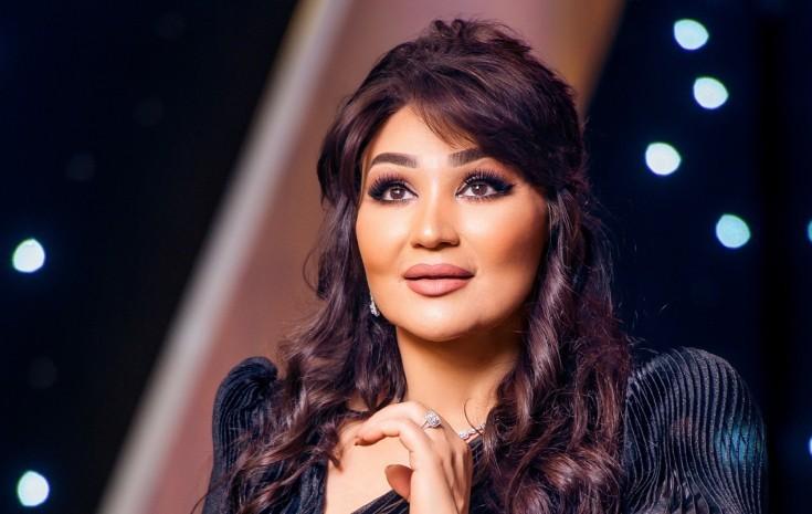 "Bir üzüm gülübsə..."